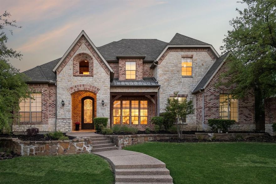 Welcome to 5125 Normandy Drive, Frisco, TX - a masterpiece of contemporary elegance nestled within an exclusive gated community. This exquisite residence offers an inviting blend of sophistication and modern comfort, perfectly situated for discerning buyers.

Step inside to discover a meticulously designed layout featuring five spacious bedrooms and four and a half bathrooms. The heart of the home is the ASID award winning kitchen by designers Helene Terry and Charlotte Comer. Equipped with top-of-the-line appliances including a prestigious 43in LaCornue double oven range, Sub Zero side-by-side refrigerator and fully integrated refrigerator drawers, all to inspire your culinary creativity. 

The home is thoughtfully crafted to offer privacy and comfort, making it an ideal setup for family and guests alike. Visual Comfort lighting fixtures throughout the home cast a warm glow, enhancing the refined ambiance. The expansive master suite is a sanctuary of its own, boasting a luxurious en suite bathroom with heated floors and a large walk-in closet that caters to the most discerning buyer. Downstairs also offers a grand entry, formal dining area, a distinct office with custom built-ins and an additional guest bedroom and full bath. Upstairs you will find three additional bedrooms, a large gameroom and media room.

The outdoor space provides a serene escape, perfect for relaxation or entertaining. As part of a gated community, residents enjoy the peace of mind and added security that come with this exclusive lifestyle.

Every corner of this smart home exudes a blend of modern elegance and sophisticated charm, making it a truly exceptional offering in Frisco's real estate market. Experience the luxury and craftsmanship of 5125 Normandy Drive - where elegance meets modern living.