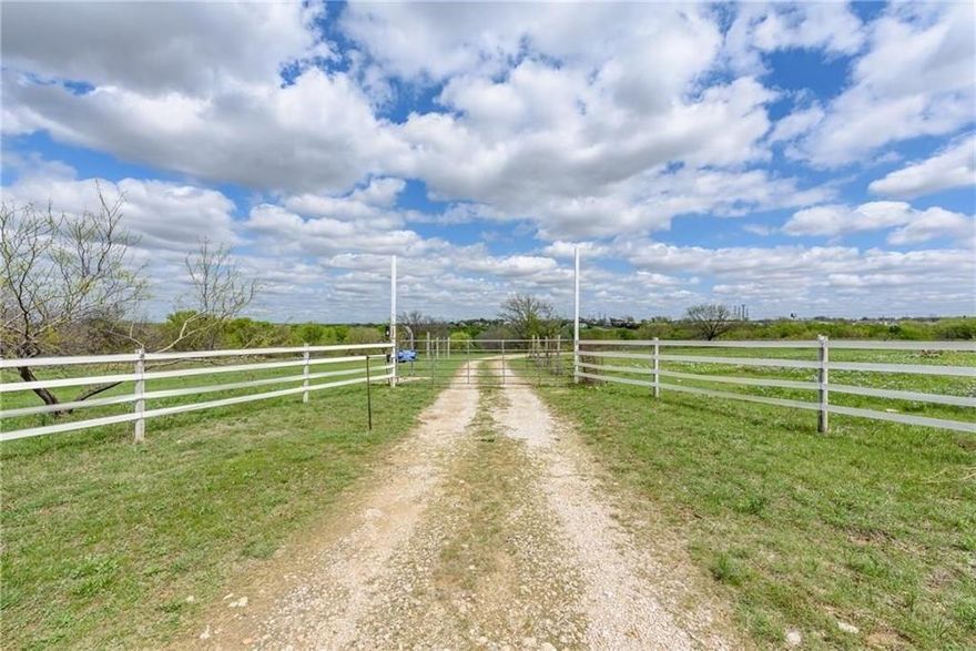 This is truly ONE OF A KIND! The property encompasses 37.53 acres, providing ample space for various purposes. Located within 10 mins from Eagle Mountain Lake in one of the most sought after areas in Tarrant County! This kind of property listing is far and few between. Large stock pond, 2 pole barns, city water to mobile home, so many possibilities to consider. With some road frontage to Lake Country Drive, beautiful mature trees of all kinds, there is no end to the ideas! 
Sold separately updated mobile home that makes for a secluded homestead in the middle of a country paradise right off of Boat Club Road or could be an office or guest quarters. Mobile home is being sold separately and is not factored into the land's value.