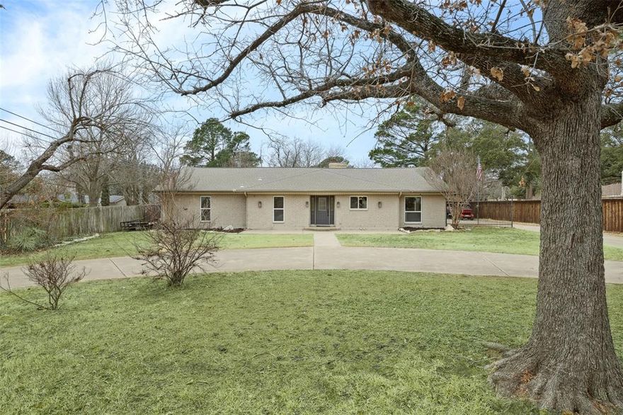 GRAPEVINE LAKE ESTATES- PRIVATE LAKE ACCESS WITH RARE DEED BOAT SLIP (1 of 25-avoid wait list)!! Situated on a generous .49 acre lot. Enjoy partial lake views of Grapevine Lake from the front of the home with lakeside trails just a short stroll away!  The lot has a circle drive and side driveway with plenty of space for privacy and parking. The home is almost 4000 sqft and offers 4 bedrooms, 3.5 bathrooms. Two spacious living areas, ideal for entertaining, a game room, or a flex space and an office. Beautiful hardwood floors throughout and fully remodeled open-concept kitchen and great room with cathedral ceiling and cedar beams. All new cabinets, granite countertops,  built-in microwave, electric range, farmhouse sink, wet bar and large island! Large covered 2-car carport and workshop ideal for hobbies, storage, or lake toys provides the perfect space for hobbiests and enthusiasts! Loads of space for tools, lawn equipment and much more! Large WALK-through attic above workshop provides ample storage space. Expansive Backyard with a beach entry pool with newly resurfaced pebble tec in 2023.  Covered back patio great for entertaining. Side garden area, spa hookup and concrete platform ready for a hot tub with access from the spacious ensuite bedroom with newly updated bathroom. Well-built chicken coop that can be stocked with farm fresh eggs! This home includes your own deeded BOAT SLIP at the private community Lake Forest Boat Club.  Quiet lake-living setting close to historic downtown Grapevine and Southlake Town Square shopping, dining, and top-rated schools.  Some projects, including the primary bathroom and roof, are reflected in the price, giving buyers a chance to customize the final touches while capturing a hard-to-find combination of lot size, lake access, and neighborhood prestige. This is a rare opportunity to secure a true lake-lifestyle property in one of Grapevine’s most desirable communities.