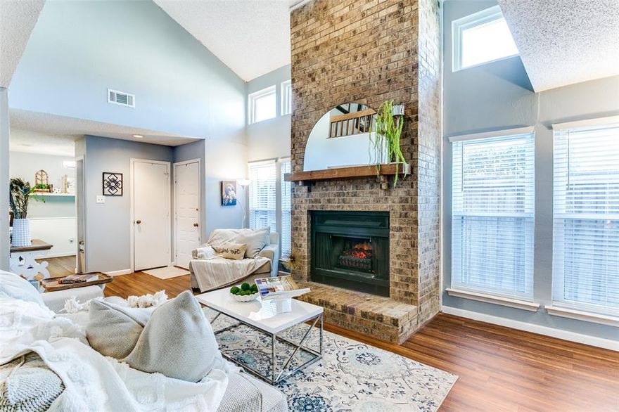 Mid-Century Charm Meets Modern Convenience in Carrollton! Nestled in the desirable Country Villa Townhomes, this 1979-built residence perfectly blends functionality and style, reflecting sought-after mid-century modern design elements. With an open floor plan, this home offers ample opportunity with design, ease of living, yet ideal for today's busy lifestyle. Step inside to experience the warmth of a charming fireplace, anchoring the living area, an ideal spot for relaxation and gatherings. The intelligently designed interior layout facilitates an effortless flow throughout, enhancing the sense of space and connectivity. The property features 3 inviting bedrooms and 2.5 baths, including a primary bedroom suite conveniently situated on the ground floor, while two additional bedrooms and an open loft perfect for reading, gaming or workout await upstairs. 
Location is everything, this property is conveniently close to major highways yet close to home depot, Starbucks, fantastic restaurants both in Carrollton and Addison. The City Recently Replaced Main Water Lines for the Community. There are several updates that this home offers, too many to list! Community HOA includes pool, gym, tennis courts, clubhouse and landscaping. Don't wait this home shows well!