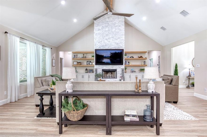 Welcome to your private oasis in the highly sought after Shadow Lakes neighborhood of Wills Point, TX. This immaculate custom built, single story home rests on 10.84 acres of serene, wooded landscape, offering the ideal balance of refined luxury and peaceful country living. The expansive acreage invites you to hike, explore, garden, or simply soak in the stillness of nature. Inside, you’ll find an open concept layout featuring 4 spacious bedrooms, 3.5 elegantly designed bathrooms, a dedicated media room for movie nights, and a versatile home office perfect for remote work or quiet study. The bright and airy living area showcases a vaulted ceiling with exposed beams, a dramatic floor-to-ceiling stone fireplace, and seamless flow into the gourmet kitchen—complete with an oversized island, built-in stainless appliances, custom cabinetry, and a walk-in pantry that will leave guests amazed. Unwind in the spa-inspired primary bath, featuring a freestanding soaking tub and an expansive walk-through shower. Whether you’re hosting guests or enjoying quiet moments, the large covered patio offers the perfect setting—ideal for morning coffee or evening fires. Additional highlights include a 3 car garage with spray foam insulation, elegant double iron entry doors, spacious laundry and mudroom, tranquil private setting with mature trees and wide open space, and a scenic pond. This exceptional property offers the best of country living with convenient access to nearby amenities. Don’t miss your opportunity to own a slice of paradise in Shadow Lakes; schedule your showing today!