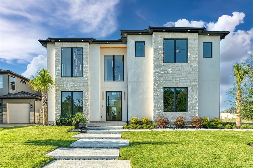 Welcome to your Custom Designed New Home! You are walking distance to Heath's Yacht and Golf Club. Step inside 4,250 square feet where high ceilings, a floating staircase and captivating chandelier will leave you wanting to see more. Your living room has an open floor plan to the kitchen. This dream kitchen is designed with the family chef in mind, hiding an additional 2nd kitchen prep area with sink and pantry storage. Your Primary Bedroom and Bathroom do not disappoint. After your spa-like Master Bath retreat, notice the 2nd floor floating stairs, catwalks, and outdoor covered balcony. Pella windows and sliding doors lead you out to a large fenced backyard with water views. This combined with the Outdoor Covered Patio, you may find yourself entertaining more! Outside, the fireplace will keep you cozy during those chilly nights. A full irrigation system waters the yard so you can spend  more time admiring your palm trees! Call me to make an appointment to see your New Home!

All information deemed reliable, but not guaranteed. Buyer and Buyer's Agent to verify all information, including schools, room count, measurements, features, amenities, and square footage.