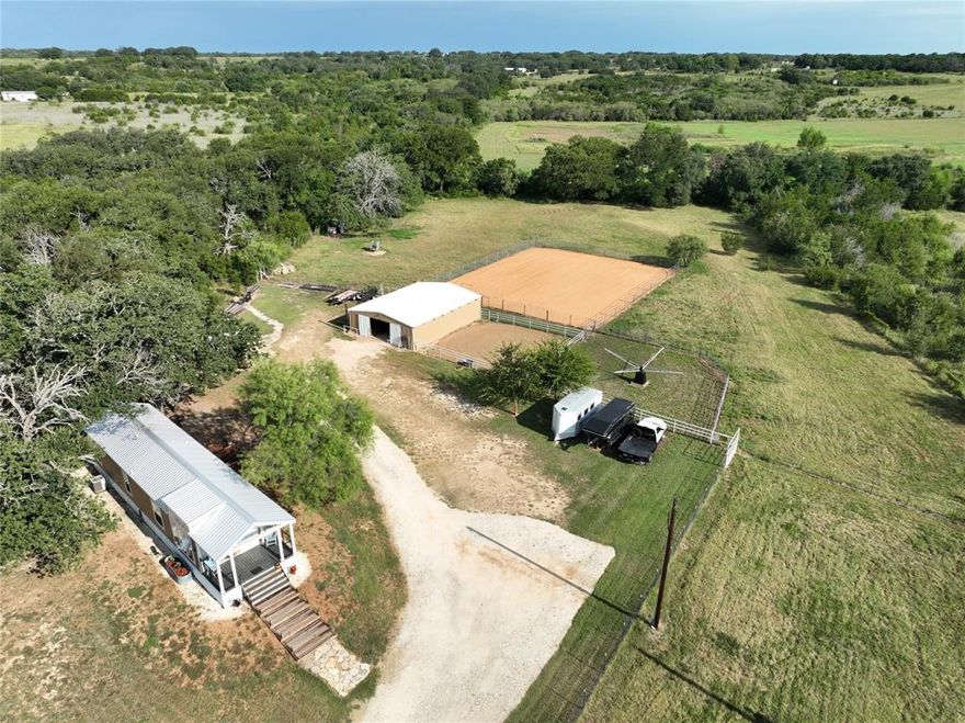 HORSE PROPERTY!!

Owner willing to provide $5,000 in concessions towards closing costs. 

This 4.77-acre property on Hwy 281 in Hico, Texas, combines a charming tiny home with exceptional horse facilities. The 2023 Champion (Weatherford) home features 2 bedrooms, 2 bathrooms, a welcoming front porch, and a side deck. Inside, you’ll find vaulted ceilings with fans, central heat and air, a factory metal roof, and all new appliances. The home is supported by a new septic system installed in October 2024 and includes both an insulated well house with electricity and a separate 8’x16’ storage building with power.

Equestrian amenities are extensive, starting with a 30’x40’ horse barn offering 1,200 square feet of space on a full concrete floor. The barn includes four stalls with rubber mats, a tack room, feed area, vet space with horse stocks, and a hallway with timed lighting. Its reinforced walls are double lined and insulated, while the ceiling has 2” closed-cell foam for comfort and efficiency. Outside, the property features a 40’x40’ pipe work pen, an 80’x100’ riding arena, and an enclosed 4-horse electric walker. Two large fenced pastures provide turnout options, and the land is fully enclosed with a three-rail pipe fence along the highway frontage.

Adding to the versatility, the property includes two full RV hookups, making it ideal for guests, boarders, or income potential. Conveniently located with highway access, this property is move-in ready and perfectly set up for both comfortable living and serious horse operations.