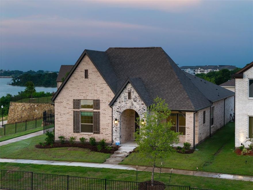 Experience luxurious lakeside living in this brand-new, beautifully crafted home, where every room overlooks peaceful water views. Set directly on the lake, this single-level residence offers 2,911 square feet of thoughtfully designed space featuring sleek modern finishes and an open-concept layout that blends comfort and flexibility. The home features 3 spacious bedrooms, each with its own walk-in closet, plus a private office that can easily serve as a 4th bedroom. A versatile flex room offers endless possibilities, making it ideal for a playroom, home gym, or secondary living area. At the heart of the home is a chef-inspired kitchen, complete with a massive island perfect for cooking, entertaining, and gathering with friends and family. The luxurious primary suite boasts dual oversized walk-in closets, while modern upgrades. The home also includes 11 built-in speakers, an EV charger in the garage, and an HVAC-integrated air freshening system. Pet-friendly leasing is available (with restrictions), and outdoor enthusiasts will love the scenic walking and jogging trails just outside the door. •Tenant is responsible for all utilities. •No smoking. •No subleasing. Live where luxury meets lifestyle in this one-of-a-kind lakeside retreat.