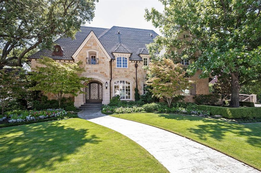 This beautiful traditional custom built Preston Hollow home provides many upgrades for today's discerning Buyer. The great room offers coffered ceilings and french doors for an abundance of natural light and a large bar perfect for entertaining. The  chefs kitchen, keeping room and breakfast area flow onto the screened porch where you can look out onto the large sparkling pool, outdoor entertaining and yard areas. The primary suite is downstairs. A secondary suite as well as two additional bedrooms on the second floor along with a game room, media room and study complete this special home. This home also has 4 garage spaces and and elevator as well.