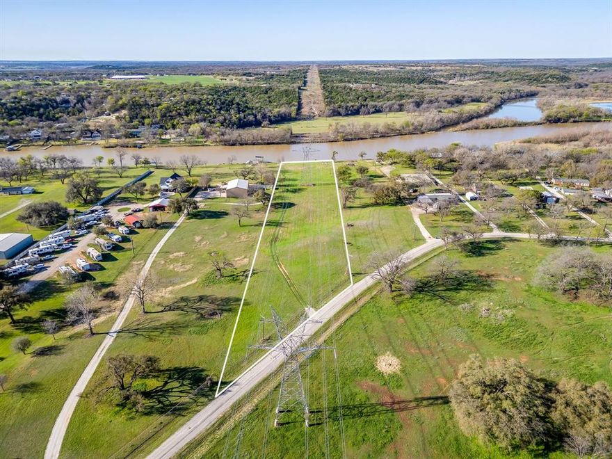 Rare opportunity to own 3.4 acres of true Brazos River frontage just outside of Weatherford. This property offers approximately 150 feet of direct river access with a dock already in place, making it ideal for fishing, kayaking, or simply enjoying waterfront views. The land is cleared with lush green grass, providing a great setting for a weekend retreat, RV setup, mobile home, or recreational getaway. Situated along a drop off into the river, the water access is perfect for those who want to step right onto the dock and enjoy river life. Whether you're looking for a private escape, investment property, or a place to spend weekends on the water, this unique riverfront acreage offers endless potential! conveniently located just minutes from Weatherford while still offering the privacy and natural beauty of Brazos River living.