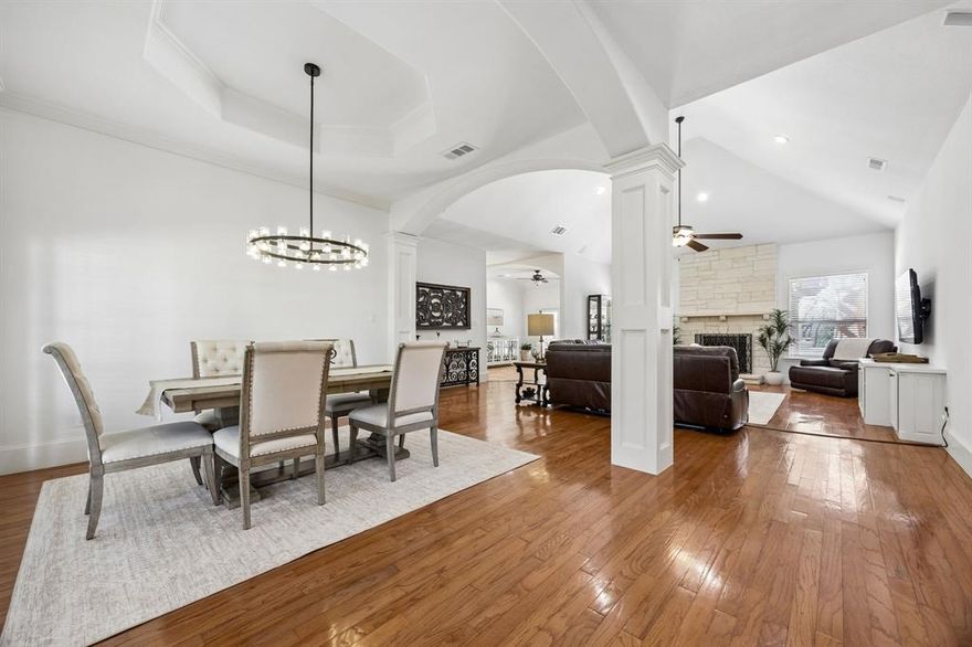 Located in the prestigious Lake Ridge community in Cedar Hill, this updated custom home sits on a private 1-acre cul-de-sac lot, offering the perfect balance of luxury, space, & everyday livability.

Extensively refreshed & move in ready, the home features whole-house interior paint, all new designer light fixtures, brand new hardware throughout, & additional upgrades, giving buyers the feel of a modern, updated home without the wait or expense.

Exceptional 1.5 story floor plan, this home lives like a single-story with all primary bedrooms located on the main level, while an expansive upstairs game-media room provides the perfect separation for entertainment, guests, or a private retreat. This layout delivers both functionality & flexibility, ideal for today’s lifestyle.

From the moment you arrive, the inviting front and side porches set the tone for relaxed elegance. Step inside through the arched entry to a light-filled, open-concept interior featuring soaring vaulted ceilings, hardwood floors, & a beautifully updated fireplace that anchors the main living space.

The heart of the home is a chef inspired kitchen designed to impress, with Italian tile flooring, updated granite countertops, a stainless steel farmhouse sink, premium Bosch appliances, a walk-in pantry, & a built-in planning desk, all seamlessly flowing into the dining & living areas for entertaining.

Private backyard oasis, with a sparkling pool, lush landscaping, oversized patio space, & large green space with room for an RV, future additions, or simply enjoying the privacy of your acre lot.

The split-bedroom design enhances privacy, while the primary suite offers a true retreat with serene pool views, a spa-like bath featuring a jetted tub, walk-in shower, & a spacious walk-in closet.

Perfectly positioned near Joe Pool Lake and Tangle Ridge Golf Club, with convenient access to major destinations including Downtown Dallas, DFW Airport, & Six Flags Over Texas.
