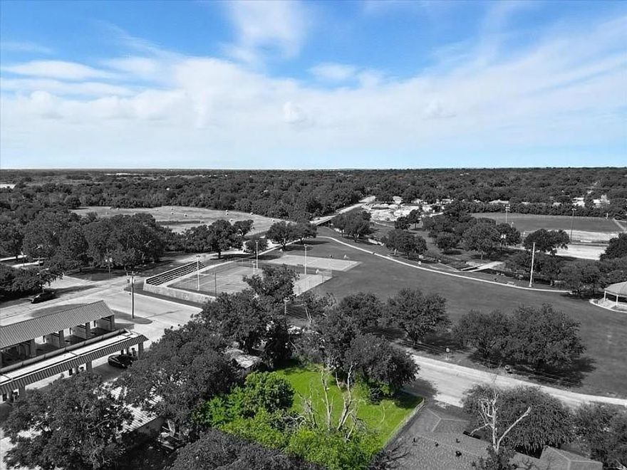 Calling all builders and commercial investors! This lot is ready for a new owner to build their dream home or can be converted to commercial zoning. You will love walking across the street to the park and community pool as well as easy access to S Main st and downtown Cleburne. Don't miss the chance to own this beautiful lot.