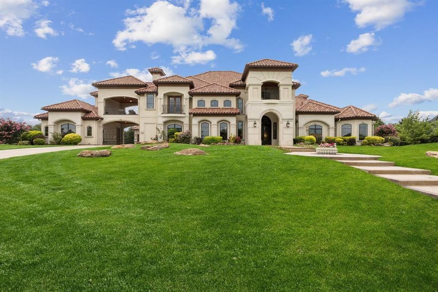 Resting on a 1-acre corner lot in the gated Estates at Craig Ranch, this breathtaking Mediterranean residence offers over 8,000 square feet of luxury living with thoughtfully designed indoor-outdoor spaces and golf course views. With a grand architectural presence, tile roof, porte-cochère, and lush landscaping, this custom home makes a statement from the moment you arrive.

Inside, elegant finishes abound, from soaring ceilings and marble floors to hand-scraped hardwoods and intricate millwork. Designed for both everyday living and entertaining, the layout features formal and casual living spaces, a dramatic family room with fireplace, and walls of windows that frame the beautifully manicured grounds.

The gourmet kitchen is a chef’s dream, complete with professional-grade appliances, double islands, and custom cabinetry, plus a butler’s pantry for seamless service. The formal dining room stuns with coffered ceilings and chandelier, while the private study and theater room add sophistication and function.

The luxurious primary suite offers a peaceful retreat with a sitting area, fireplace, and spa-like bath featuring a soaking tub, walk-through shower, and dual vanities. Upstairs, enjoy golf course views from the balcony, plus a large bonus space, perfect for a home gym or game room.

Outdoor living is elevated with a resort-style pool and spa, multiple lounge areas, covered patios, and tall trees offering privacy and serenity. 

Additional highlights include two 2-car garages, a custom wine cellar, abundant storage throughout and much more.

This is a rare opportunity to own one of the premier homes in Craig Ranch, blending timeless elegance with modern luxury.