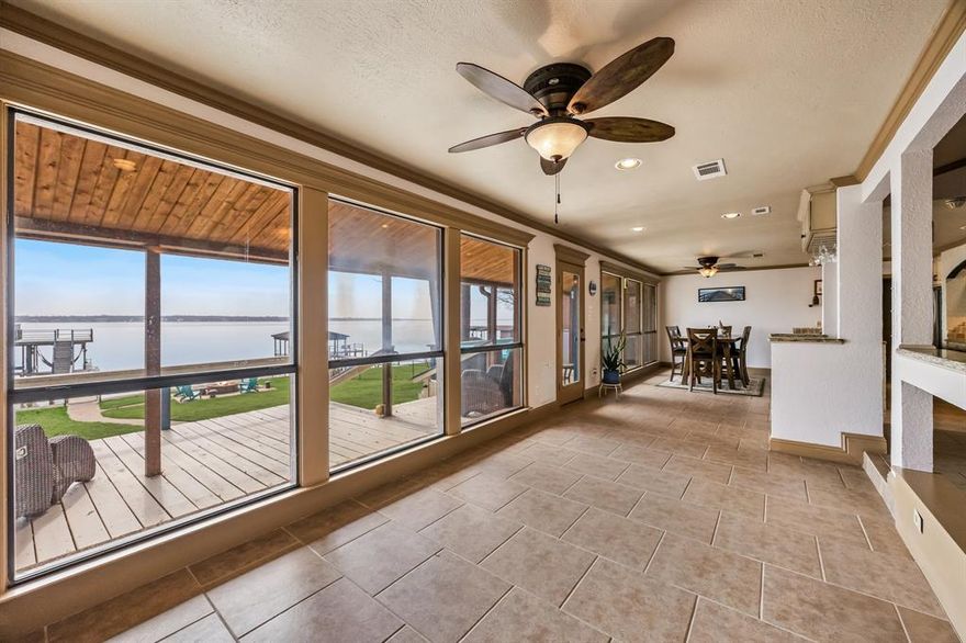 Welcome to your dream waterfront retreat in Cedar Creek Country Club, perfectly positioned on open water with breathtaking views and direct lake access. This charming lake home offers the ideal blend of comfort, character, and lifestyle, whether you're searching for a full-time residence, weekend escape, or investment opportunity on Cedar Creek Lake. Enjoy expansive outdoor living with a spacious backyard leading to your private dock and shoreline, perfect for boating, fishing, paddleboarding, and soaking in the lake life. Relax by the firepit, entertain guests on the back patio, and take in the peaceful water views that make this location truly special. Inside, the home features an open-concept layout with vaulted ceilings, abundant natural light, and inviting living spaces designed for gathering. The kitchen offers ample cabinetry, generous counter space, and a functional layout that flows seamlessly into the dining and living areas, ideal for hosting family and friends. Located in the highly desirable Cedar Creek Country Club community, residents enjoy access to golf, clubhouse amenities, dining, and a true lake-living lifestyle just a short drive from Dallas. If you're looking for a Cedar Creek Lake waterfront home on open water, this is the one. Schedule your private showing today and experience lake living at its finest.