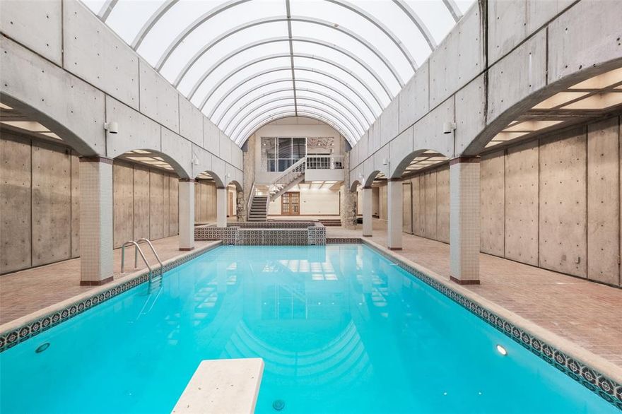 This serene, custom-built estate is privately gated and nestled on nearly 17 acres of picturesque land in Granbury. The property features a stunning park-like drive, winding through natural beauty before opening up into a spacious circular drive leading up to the estate. The estate boasts breathtaking panoramic views of the lake, with nearly 420 feet of pristine waterfront. 

The home welcomes you with a porte-cochère at the entrance. Inside, the foyer opens to a full bar and gathering area, highlighted by a floor-to-ceiling stone fireplace. The expansive living room flows seamlessly into the formal dining room, which connects to the kitchen and breakfast area—all offering spectacular lake views. The kitchen is equipped with high-end stainless steel appliances, including a wine fridge, ice maker, and Subzero refrigerator, as well as a generously sized walk-in pantry and laundry room.

The  primary suite includes a spa-like bath with separate his-and-her sides, with large closets. There is a sitting area leads out to a private balcony. There is a private study, also has balcony access, offers an ideal space for work or relaxation. The second floor features five spacious bedrooms, each with its own ensuite bath, as well as a large family room with captivating lake views. This is also an excellent investment or development opportunity.