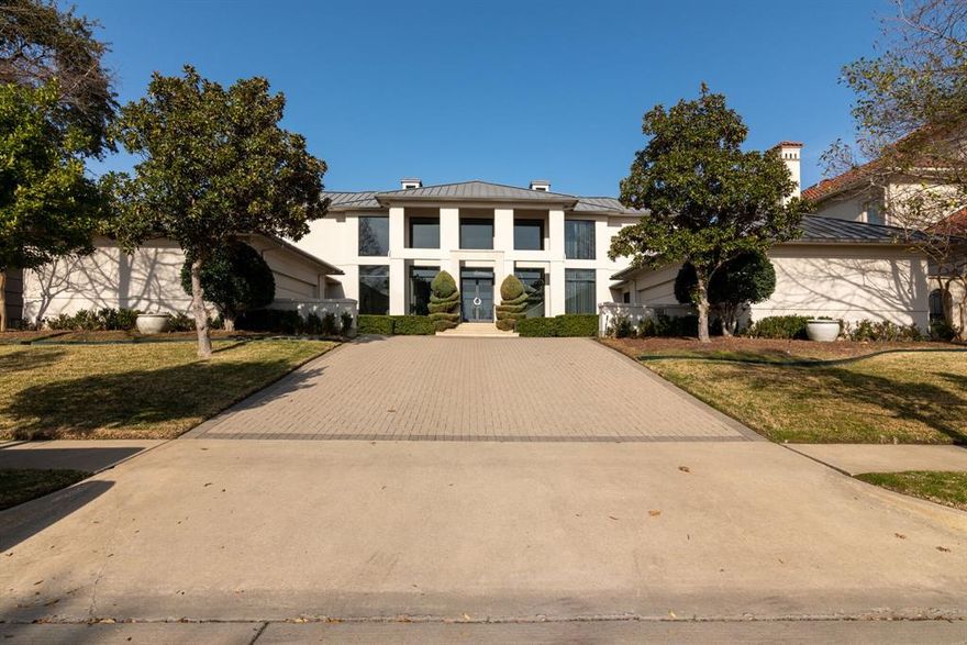 This exquisite property is found in a polished gated community at the highest point in Dallas right at hole 15 on the golf course. As you enter the residence, you are greeted by a grand foyer with soaring ceilings and an abundance of natural light, creating a sense of openness and serenity. The open concept design seamlessly connects the main living areas, allowing for seamless flow and effortless entertaining. The expansive windows provide breathtaking views of the surrounding landscape, while the carefully selected finishes and fixtures create an atmosphere of refined elegance. The master suite is a true sanctuary, boasting a generous layout, a private sitting area, and a spa-like ensuite bathroom. Relax and unwind in the soaking tub or indulge in the luxury of the walk-in shower.The landscaped yard provides a tranquil retreat, complete with a spacious patio area for outdoor dining and entertaining. Meticulously designed pool area that epitomizes the pinnacle of outdoor living.