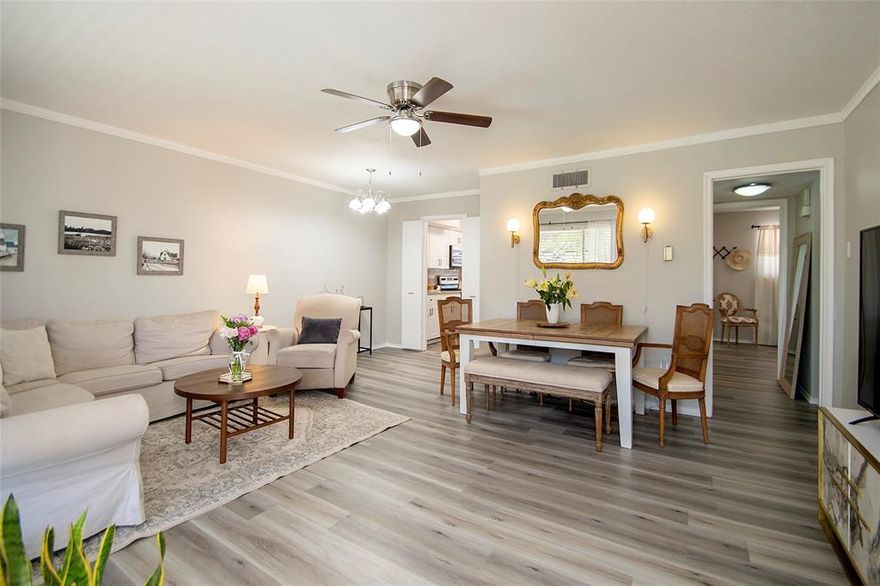 This one's a standout!  Updated, light-filled, and exceptionally located, this end unit checks all the boxes. Perched on the second floor of a small, charming complex, it offers open-concept living with total flexibility — ideal for work, play, or both.
Enjoy front and back balconies plus relaxing pool views, all in a quiet, well-kept setting. All appliances included, even washer and dryer, making this home truly turnkey and move-in ready.  All utilities paid, except your internet. Includes one assigned parking space.