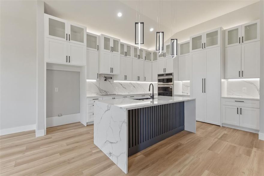 PICTURES DON'T DO THIS HOME JUSTICE! Stunning 2026 modern farmhouse new construction featuring 4 bedrooms, 3 full bathrooms, and thoughtfully curated luxury finishes throughout. Designed with both comfort and functionality in mind, this home offers a RARE secondary primary suite with its own private ensuite bath ideal for multigenerational living or hosting guests in style. Step inside to soaring 12-foot ceilings, a spacious dedicated office perfect for working from home, and an expansive open-concept layout highlighted by custom cabinetry with LED lighting and a hidden walk-in pantry. A dramatic double-sided fireplace connects the living room and primary suite, creating warmth, ambiance, and sophistication. The spa-inspired primary retreat features a separate soaking tub and oversized frameless glass shower for the ultimate experience. Situated on a large fenced corner lot, this home offers both privacy and added outdoor space, complete with a large covered backyard patio perfect for entertaining or relaxing. Luxury, value, and thoughtful design all in one exceptional home! Schedule your tour today before it's gone!! Ask about our builder incentives with our preferred lender, including interest rate buy-down options, 0% down programs for qualified buyers, closing cost assistance, and or an appliance package!!