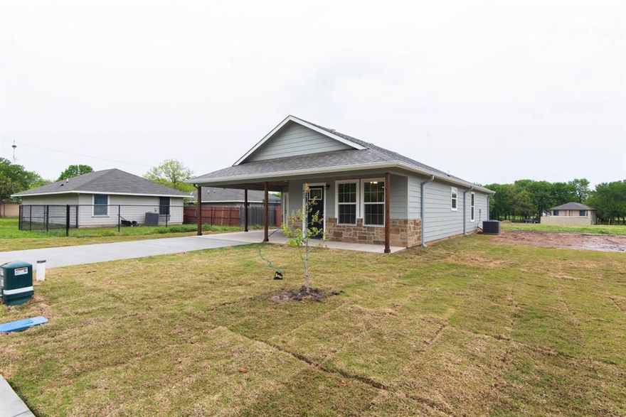 2021 Built home. Beautifully stained concrete floors throughout the home's high traffic areas and carpet in bedrooms. Custom wood cabinets featured in bathrooms, kitchen. Granite counters in the kitchen and marble in bathrooms. Stainless steel range, dishwasher. Walk-in pantry with custom shelving, brushed nickel hardware, and faucets, led lighting, ceiling fans. The Master bedroom has an attached bath with a walk-in marble shower and a walk-in closet with custom shelving. Outside is smart siding with stone accents with the car shed along the driveway. Chain link Fence around the property. Buyer to verify schools and measurements