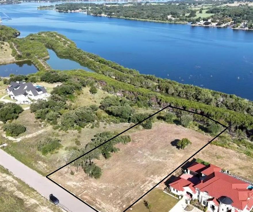 Wake up to the most breathtaking views of Lake Granbury—where soft breezes and painted sunsets set the scene for everyday living. Tucked inside the quiet, serene community of Luker Ranch, this spacious 1+ acre lot is the perfect canvas to build the home you’ve been dreaming of. The build site is flat, keeping construction simple, while the surrounding landscape feels like a retreat away from the hustle. Commuting is easy with quick access to Hwy 67, the Chisholm Trail Parkway, and a straight shot into Dallas or Fort Worth. Yet, just minutes away, Granbury offers small-town charm with live music, theater, shopping, and dining. Luker Ranch truly feels like a best-kept secret—peaceful, inviting, and ready for your forever home. Bring your plans, your vision, and your builder—the time to make it yours is now.