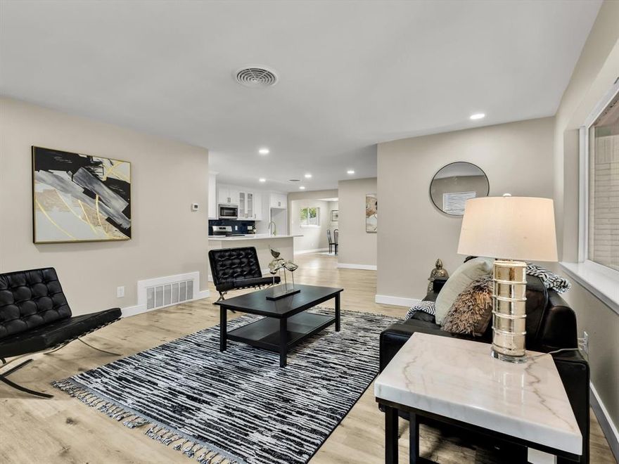 Offering Owner Financing and Creative financing and Lease MOVE in to purchase is available. Newly renovated 4-bed, 2-bath, 2-car,  home in a prime location of The River District! NEW ROOF, NEW HVAC, NEW WATER HEATER, Move-in ready and tons of brand new features, NEW fresh paint, NEW floating floors throughout, NEW LED lighting, NEW windows that flood the space with natural light as well as updated bathrooms. The modern kitchen boasts NEW granite top, gold accents, NEW sleek custom cabinetry, and a stunning navy blue herringbone backsplash. Updated bathrooms offer contemporary finishes with a modern paint scheme and trendy tile. Enjoy a spacious walk-in pantry with accent tile, full-size laundry room, two-car garage, large walk in shed with power, backyard patio to entertain, grill and spend time with your loved ones. Conveniently located near 7th street, River District, Downtown Fort Worth, highways, local eateries, and Lockheed Martin, this home offers easy access with a charming small-town feel.