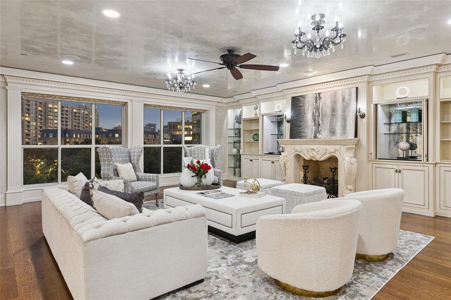 Experience refined style in this custom residence in The Mayfair. Nestled in the heart of Turtle Creek known for luxury living with convenient access to the popular Katy Trail, Dining and Entertainment in the 
Uptown, Downtown and Dallas Arts District.  Featuring 3925 sq ft of living space on a single floor and designed with views that hug Turtle Creek Park, this home exudes luxury and privacy. The home offers Grand Living and Dining spaces, an elegant powder room, a Chef-ready
kitchen with gas stove-top, multiple ovens, Sub-Zero Fridge, abundant cabinet space, climate-controlled wine cellar, 2 guest bedrooms, a home Office,  Hallway cleverly-designed for displaying art,  and a primary wing fit
for royalty! Finishes include elegant Venetian plaster in  the formal areas, custom cabinetry throughout, exquisite crown molding,
window coverings, magnificent chandeliers, rich hardwoods, laundry center with separate service
entrance and 2 terraces.  A Control IV System to helps manage the property while at home or away. The home conveys 4 
parking spaces, and 2 storage units conveniently located in the garage area.
The Mayfair offers its residents amenities including 24-hour Valet and Concierge, a generous fitness center, a
coffee area to relax or visit with residents, a recently refurbished sparkling pool and spa, numerous outdoor cooking areas, and a Lobby Level Conference Room.  Take an elevator ride to the Penthouse Level and find The Mayfair Room (for Billiards, Card Games and watching sports) or enjoy The Sky Club with spectacular Skyline Views of Downtown and available for Residents to host Private Events.  A special home at a truly special address.