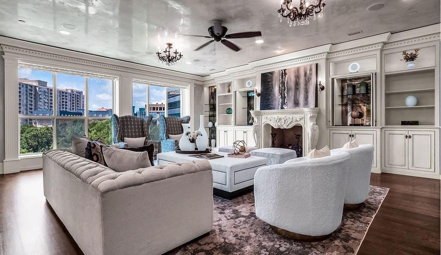 Experience Manhattan-style in this custom residence in The Mayfair. Nestled in the heart of Turtle Creek
and known for luxury living offering quick access to the Katy Trail, entertainment and dining in the
Uptown District, Downtown and the vibrant Dallas Arts District.  With 3925 sq ft of living space on one floor and designed with views that hug Turtle Creek Park, this sophisticated home offers Grand Living and Dining Areas, an elegant powder room, a Chef-ready
kitchen, climate-controlled wine cellar, Den (or 3rd bedroom), Office, Guest Suite and a primary wing fit
for royalty! Finishes include elegant Venetian plaster in formal areas, custom cabinetry throughout,
window coverings, magnificent chandeliers, rich hardwoods, a laundry center with separate service
entry and a Control IV System to help manage the property while away. The home conveys 4 garage
parking spaces, and 2 storage units conveniently located in the garage area.
The Mayfair offers its residents amenities including 24-hour Valet and Concierge, fitness center with
coffee area, sparkling pool, outdoor cooking area, conference room, billiard room and the Sky Club for
entertaining with spectacular views of Downtown.