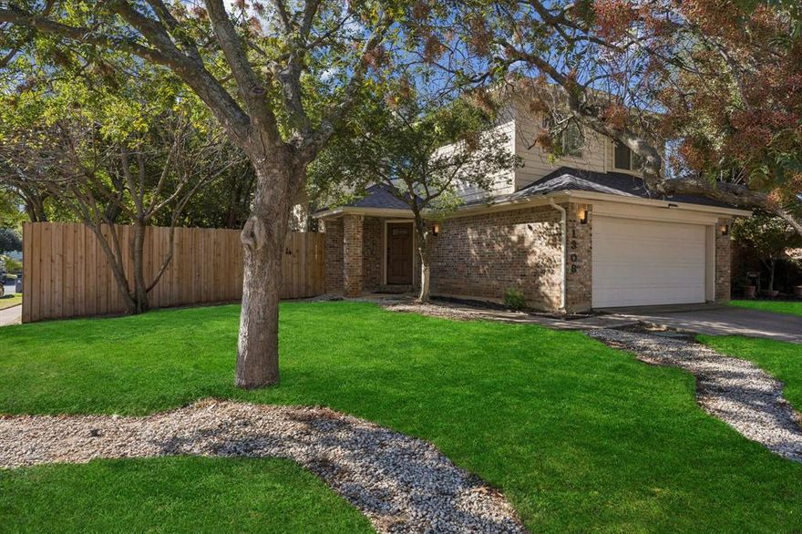 Welcome to 1308 Boardwalk Street, a beautifully updated two-story residence offering comfort, style, and thoughtful upgrades throughout its 1,886 square feet. Built in 1984, this 3-bedroom, 2.5-bath home combines open, light-filled living areas with a refined modern aesthetic. The inviting entry reveals soaring ceilings and large windows that flood the interior with natural light, creating a bright, uplifting ambiance from the start. The main living area centers around a striking fireplace and wet bar, offering a warm gathering spot with seamless flow to the dining and kitchen spaces—perfect for hosting or relaxing at the end of the day. The remodeled kitchen features double ovens, soft-close cabinetry, generous storage, and a dedicated coffee station designed for everyday convenience. The upgraded guest bath, luxury vinyl plank flooring, and level 5 wall texture enhance the home’s contemporary character. Upstairs, the spacious primary suite showcases vaulted ceilings, a refreshed en suite bath, and upgraded window glass that invites light while maintaining privacy and efficiency. Secondary bedrooms include walk-in closets and access to a beautifully finished full bath that provides a calm, spa-like atmosphere. Additional improvements include a digital thermostat with room sensors, an upgraded Simplisafe security system, and enhanced commodes in two baths. Outdoors, a magnificent Magnolia tree shades the private backyard—a serene retreat ideal for morning coffee or quiet evenings. Located in a peaceful neighborhood just minutes from the entertainment district, this home delivers the rare combination of tranquility and accessibility, making it an exceptional place to call home.