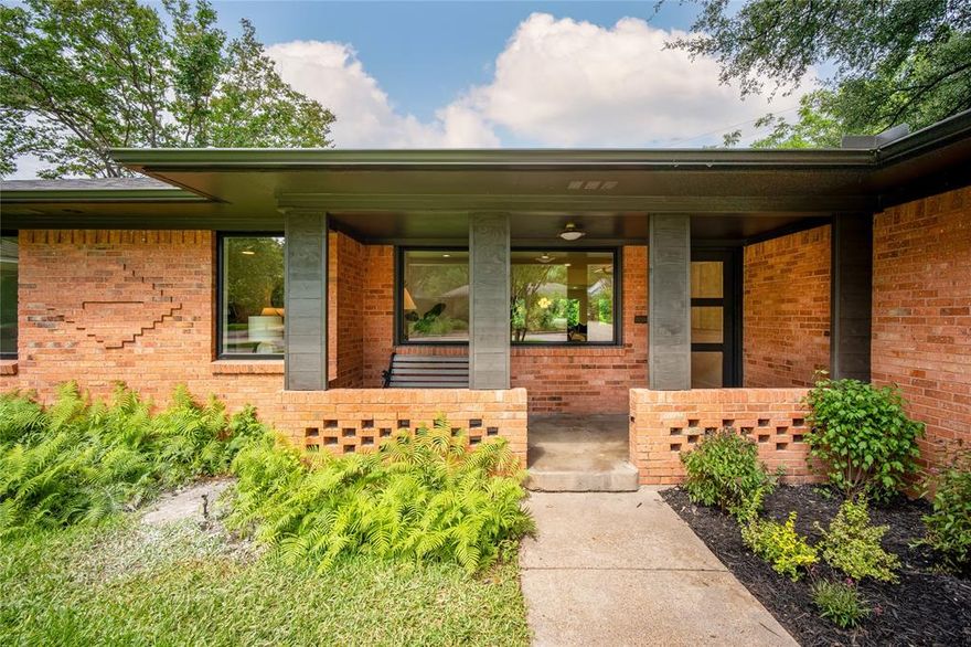 1413 Design Studio presents another remarkable renovation in the highly sought-after East Dallas area! This Alger Park treasure may look modest from the outside, but it opens up into a nearly 2,500-square-foot sanctuary meticulously designed for hosting family and friends. As you approach, you are welcomed by professional landscaping and a charming covered front porch. Inside, expansive windows bathe every room in natural light while offering picturesque views of the front yard and the sprawling one-third-acre property. The home’s thoughtful layout begins at the entry, which includes a convenient coat closet and leads into a spacious living room. This area flows seamlessly into the dining space, a well-equipped kitchen, and a second massive living area. Culinary enthusiasts will appreciate the gas range, ample prep surfaces, and a dedicated walk-in pantry. The primary suite serves as a peaceful retreat, featuring a walk-in closet and an exquisite bathroom complete with a double vanity and a soaking tub-shower combination. The upper level reveals a versatile flex space nestled among the treetops, characterized by beautiful wood ceilings and striking white beams. Whether you envision a home office, a library, a game room, or a cozy guest suite for visitors, this adaptable area offers endless possibilities. With plenty of room to grow and distinct spaces for everyone, this home ensures you will be sitting pretty in East Dallas.