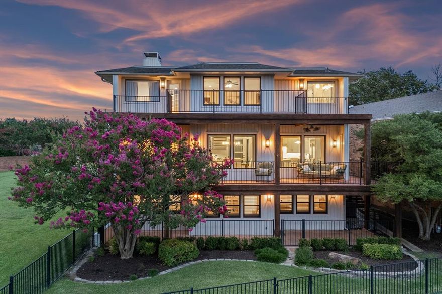 New Year. New Views. A New You - by the Lake.

This exceptional hillside residence presents a rare opportunity in the heart of Rockwall, featuring captivating lake views from all three levels. Nestled in the rolling hills of gated Chandlers Landing, the home offers a lifestyle defined by beauty, balance, and resort-style living.

Enjoy scenic neighborhood walks, tennis or pickleball, fishing, boating, and lakeside sunset dining at the HOA’s waterfront restaurant all just moments from your door.

Enter through a private gated courtyard into the updated main living level, where open-concept spaces showcase elegant finishes and warm European-inspired character. Floating stairs lead to the top-level owner’s retreat, where mornings begin and evenings wind down on the extended deck, savoring sips and sights with some of the most breathtaking views in all of Rockwall.

The owner’s suite features two oversized walk-in closets with custom built-ins, including space for a stackable washer-dryer, room for workout or desk, plus a spa-inspired updated bath. The lower level offers three additional bedrooms or flexible living spaces, two full baths, and walk-out access to a covered patio and grassy area.

A touch of hillside Tuscany meets lakeside Rockwall!