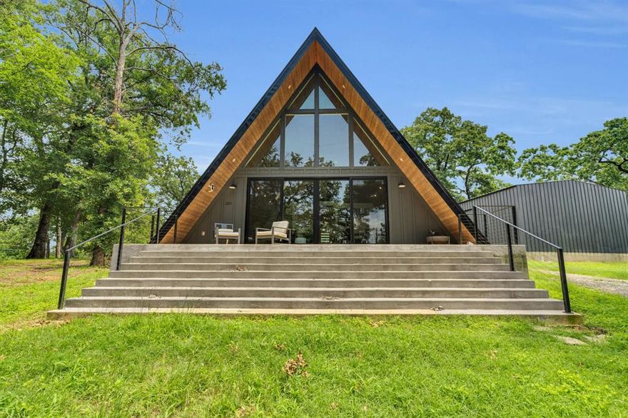 MAJOR PRICE REDUCTION!
Welcome to your lakeside retreat! 
Just 45 minutes from DFW, this stunning custom-built A-frame home by Sabado Homes (2022) combines modern luxury with serene lake living in Tool, Texas.
This fully furnished 3-bedroom, 2-bathroom home offers breathtaking views of Cedar Creek Reservoir from nearly every room. Nestled beneath a canopy of mature trees on a .19-acre lot.
A proven performer on Airbnb, this home has exceeded prior rental years and is on track to surpass them again in 2025—ideal for second-home buyers as a weekend getaway, investors as it is a proven income generator, or both!
Property Highlights:
Custom design with luxury finishes throughout
Fully furnished with top-quality furniture from the Rustic Warehouse included.
$75 Annual HOA Fee includes access to:
Private community boat launch (3-minute walk) &
Resident-only dock perfect for fishing or relaxing.
Whether you're seeking a weekend getaway or a high-yield short-term rental, this turnkey lake property checks every box. 
This breathtaking home is priced to sell! Don’t miss out on this incredible opportunity. Schedule a showing today & see everything this beautiful property has to offer!