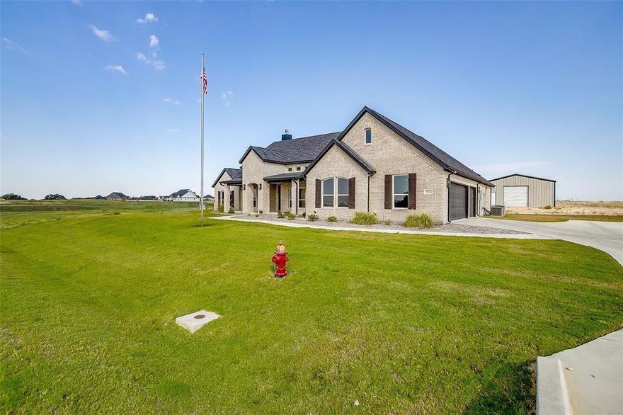 THIS HOME IS MOVE IN READY! CALL TODAY! Country living at its best, in this brand new sub division, Rocky Top Ranch. Easy access to Boyd and highway 114 for commuters. This 4 bedroom, 2.5 baths, plus a study, and massive covered patio for entertaining on this 1 acre lot with oversized 3 car garage. Has large open concept for Kitchen to family room, and a fireplace. 30 X 30 shop included!  Builder spec home, all plans and elevations are susceptible to changes during the construction process.