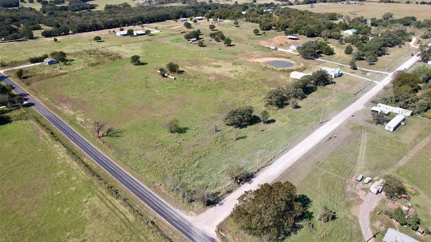 NEW PRICE! Endless possibilities await! 5.4 beautiful acres with some trees and electricity available from neighboring acres. 2 sides of the property are fenced. Enjoy peaceful living with serene views and just a quick 7 min drive to I-35, 17 mins to Cleburne or Hillsboro and just 45 mins away from the heart of Fort Worth!