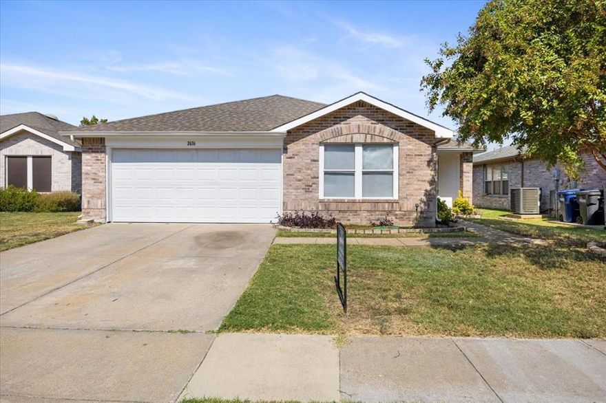 Location, location, location!  Close to I-75 and Hwy 380.  Close to schools.  The UTD campus is around the corner for your higher learning.
The interior boasts a brick wood-burning corner fireplace in the living area.  Wood-looking plank flooring throughout for easy maintenance. Bonus pantry doubles as a utility room off the kitchen.  The primary bedroom features a separate shower, garden tub, medicine cabinet, and a great walk-in closet.  Garage floor freshly painted—large fenced back yard.  There is a huge covered patio in the back, perfect for a hot tub, lazy summer evenings, or a nice covered area for the little ones to play.