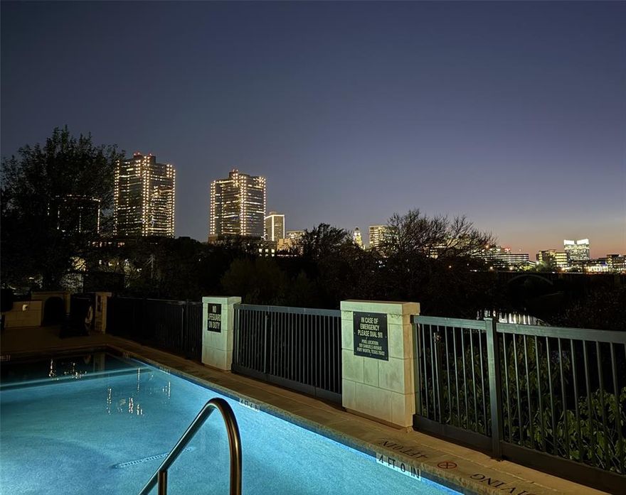 Luxury 2 bedroom, 2 full bath condo located in the exclusive Villa De Leon which sets above the banks of the Trinity River. Condo 110 is an entertainers dream. The kitchen has Viking appliances which includes a six burner gas cooktop, double oven, built in refrigerator and microwave. The expansive open floorplan offers view to wall of windows and sliding glass doors out to patio. This corner condo has direct access from the owner's patio to the outdoor entertaining area which offers pool, heated spa, pergola, seating and tables, gas grill and pizza oven. This is the perfect area to enjoy the gorgeous sunsets, Trinty River view and nighttime Fort Worth skyline from.  The exclusive Villa De Leon has 24 hour concierge security, that is always happy to assist, welcome your guests, receive packages, etc.  The spacious primary suite has an ensuite bath featuring a jetted tub, separate shower, dual vanities, and a generous walk-in closet. The secondary bedroom also includes its own walk-in closet, perfect for guests or flexible use and an additional pocket door to close their area for more privacy. Community amenities elevate the lifestyle even further: with a well-appointed community room, offering a piano, pool table, seating areas, and kitchen that may be used for hosting events. The HOA covers gas, water, sewer, and trash costs. Secured parking garage is located in lower level, with two deeded parking spaces and building storage units. Owner's guests have access to a gated parking lot just across the street.  Sundance Square is only minutes away.  Luxury, convenience, and comfort come together beautifully in this exceptional Villa de Leon condo. Drapes, washer and dryer are included in listing.