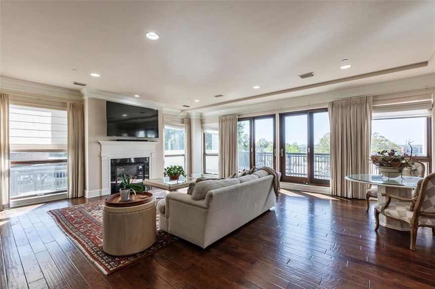 First-floor condo in the exclusive Villa de Leon offering convenient access from your private patio to the very spacious outdoor amenities area which includes... pool, heated spa, pergola with outdoor seating, gas grill, and pizza oven. This is the perfect area to enjoy the gorgeous sunsets, Trinty River view and dynamic nighttime Fort Worth skyline from. The exclusive Villa De Leon has concierge that is always happy to assist, welcome your guests, receive packages, etc. The open floor plan in this condo is an entertainers dream, providing room to host large gatherings. The light-filled living room features a gas fireplace, wall of windows and sliding glass doors out to your patios. This condo has two patios. The gourmet kitchen includes a built-in Viking refrigerator, commercial-grade gas cooktop with cover and vent hood, double ovens, island, and large breakfast bar, very similar to double islands. The spacious primary suite offers room for sitting area with an ensuite bath featuring a jetted tub, separate shower, dual vanities, and a generous walk-in closet. The secondary bedroom also includes its own walk-in closet, perfect for guests or flexible use. Community amenities elevate the lifestyle even further: with a well-appointed community room, offering a piano, pool table, seating areas, and kitchen that may be used for hosting events. The HOA covers trash and water costs. Secured parking garage is located in lower level, with two deeded parking spaces and building storage units. Owners have access to an additional gated parking lot. Sundance Square is only minutes away.  Luxury, convenience, and comfort come together beautifully in this exceptional Villa de Leon condo. Drapes, washer and dryer are included. Sellers will also be willing to include furnishings, with an acceptable offer.