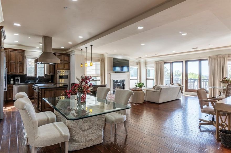 Experience refined living in this stunning 2-bed, 2-bath corner residence in the coveted Villa de Leon. This first-floor condo offers effortless luxury with concierge service—including convenient twice-weekly dry cleaning pickup—and controlled access for peace of mind. An elevator provides direct access to the gated underground garage, where two reserved spaces await, with additional gated parking available. A private storage unit is also included.  Inside, sophisticated design meets everyday comfort. The light-filled living room features a wall of windows overlooking the private patio, bathing the space in natural light and complementing the cozy fireplace. The open layout flows into the dining area and gourmet kitchen, where a built-in Viking refrigerator, commercial-grade gas cooktop with cover and vent hood create a chef-ready environment. The spacious primary suite offers a serene retreat with an ensuite bath featuring a garden tub, separate shower, dual vanities, and a generous walk-in closet. The secondary bedroom also includes its own walk-in closet, perfect for guests or flexible use. Community amenities elevate the lifestyle even further: a sparkling pool and spa with poolside pizza oven and grill plus a gorgeous river view, a fitness center, and a social room with adjacent kitchen.  Luxury, convenience, and comfort come together beautifully in this exceptional Villa de Leon home.