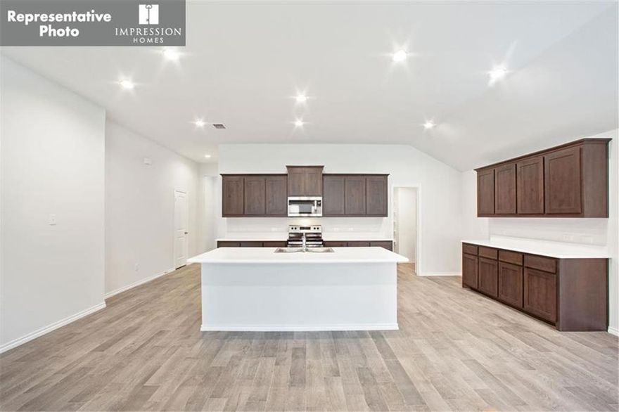 MLS# 20383738 - Built by Impression Homes - Ready Now! ~ The Lincoln plan offers an open concept design with beautiful California-style kitchen, large island, and vaulted ceilings and a Texas-sized walk-in pantry for small appliances and storage. The elegant private owner suite offers separate shower, garden tub, dual-sink vanity and large walk-in closet. Spacious, private secondary bedrooms and separate laundry room!