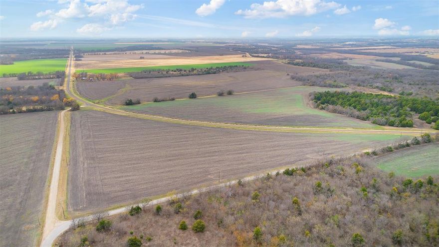 Prime 2.781 acres in Ennis with rare double road frontage along FM 985 and Colvin Rd. This property offers road access on two sides, providing excellent versatility for residential use, agricultural purposes, or future development. The land is level, unrestricted, outside the floodplain, and currently carries an ag exemption for low holding costs. Previously used for row crops.

Utilities: Electricity available at the road (Navarro County covers first 75 ft of extension; standard fees apply beyond). Water well on-site. No sewer.

With no zoning, no restrictions, and no HOA, this tract offers maximum flexibility. Ideal for building, weekend use, or long-term investment in a desirable and accessible location. This lot is part of a larger parent tract (Property ID 199684, 11.24 acres) Two additional tracts are also available for purchase.