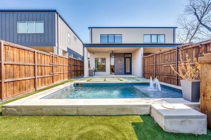 Impeccably crafted modern SFA, by sought-after modern builder Fairmont Homes, ideally situated just steps from Knox-Henderson and Lower Greenville’s best dining, shopping, and entertainment. This 3-bedroom, 4-bathroom single-family attached home with a pool and a private office showcases refined finishes and thoughtful design throughout.

A bright, open living space with soaring ceilings creates an inviting atmosphere that’s perfect for entertaining. The stunning chef’s kitchen features custom LED-backlit cabinetry, commercial-grade Dacor stainless steel appliances, and quartz and marble countertops.

Retreat to the expansive primary suite with a spa-inspired bath, oversized soaking tub, and a beautifully customized walk-in closet. White oak hardwood floors, designer lighting, smooth-finish walls, and a sleek linear gas fireplace elevate the interiors.

Enjoy seamless indoor-outdoor living with a covered patio, premium outdoor kitchen, and pool, outdoor shower, and sun deck—ideal for hosting summer parties. Built with foam insulation, a tankless water heater, and pre-wired for sound. Secured by a metal entry gate, Ring doorbell, and exterior cameras. Exceptional quality throughout.