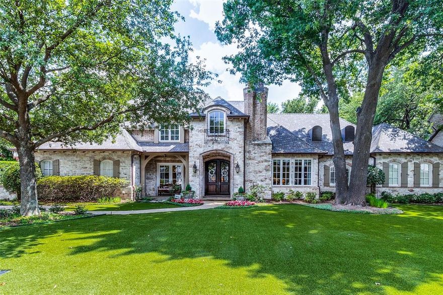 A gorgeous, oversized 125' lot sets the stage for this wonderful home with outstanding drive-up appeal. Beautifully landscaped, with great trees, in the heart of Preston Hollow! Custom designed, built by Joe Kain, and updated over the years, this property exudes comfort and quality. Tastefully appointed, with hardwood flooring, custom lighting, and top quality fixtures. Wonderful floor plan, ideal for entertaining. Open kitchen, breakfast room, and family room look out through a wall of windows to an incredible pool, spa, and backyard, complete with covered grill area, gazebo with firepit, and artificial turfgrass. Downstairs primary bedroom with sitting area, bonus room ideal for fitness equipment, handsome library with built-ins. Upstairs are 3 generously proportioned bedrooms with en suite baths and closet areas, plus a large gameroom. Three car garage, abundant storage including large walk-out attic ideal for expansion. Please see Transaction Desk: survey, SDN, offer instructions.