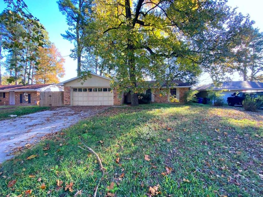 A three bedrooms and two bathroom property with a two cars attached garage.