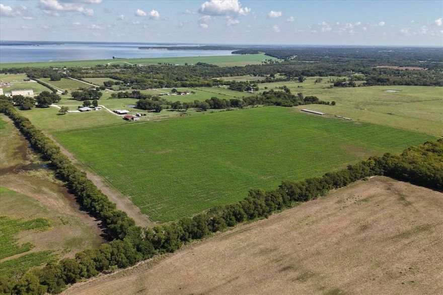 Exceptional opportunity to own 74± acres just minutes from Lake Ray Roberts, ideal for a private ranch, family retreat, or income-producing property. The land is fully fenced and cross-fenced, with pecan trees, established hay production, and facilities for cattle and horses, including a roping arena and implement barn.

There are three residences on the property:

3 bed, 2 bath mobile home 840 sq ft with covered parking

3 bed, 2 bath stucco home 2090  sq ft with separate entry drive,

tiny home with full bath and kitchen, perfect for guests, rental, or office use

Multiple build sites offer stunning sunset views, making this property ideal for creating your dream home or expanding your rural estate. Located in close proximity to Lake Ray Roberts with easy access to recreation, fishing, boating, and major roadways.

This is a rare chance to own a productive, multi-use property with space for family, livestock, and more. Buyer Agents, please be prepared to provide buyer proof of funds and or lender pre-qualification prior to scheduling an appointment. List Agent present for all showings.