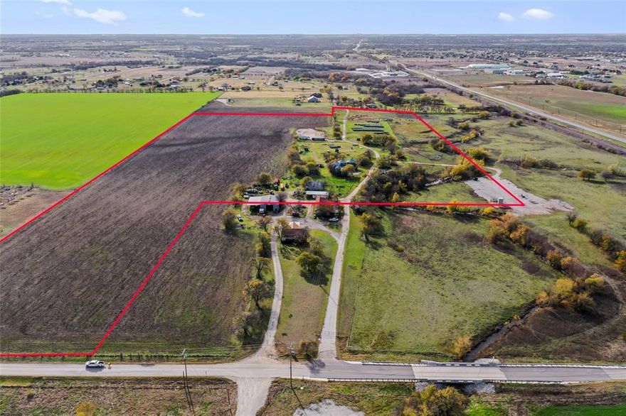 This lot is part of an expansive 169.79-acre property that is comprised of six parcels—34.4 and 57.7 acres, respectively on the north side of Seaborn and 6.37, 18.8, 9.18 and 42.4 AC on the south side of Seaborn. It is adjacent to FM 156 and less than one mile from FM 2449. In addition, it is only minutes from I-35, Denton and Alliance Airport, streamlining access to regional transportation and efficient supply chain management.

Ponder, Texas, has experienced notable development in recent years. The city's comprehensive plan reflects a forward-thinking approach, with a strong focus on infrastructure improvements and industrial development.

This property is within the Ponder city limits and offers an opportunity to collaborate with local authorities regarding suitable solutions for water and sewer services that align with your development plans. Whether you're seeking to establish an industrial complex or embark on a unique development project, this property's advantageous location, accessibility, and potential for city utilities make it an exceptional investment.