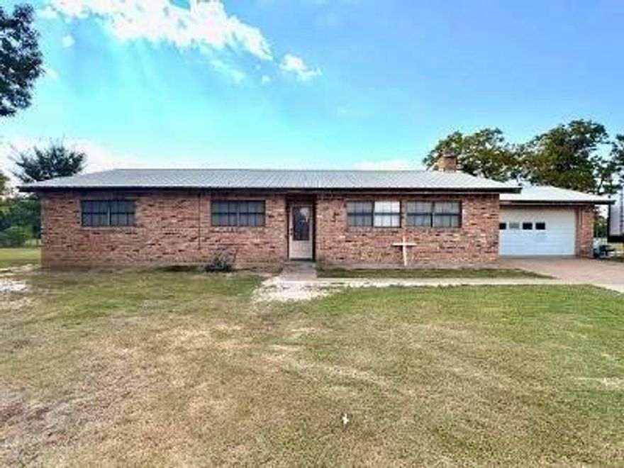 This brick home sits on 2.4 acres with a country setting. It has three bedrooms with 2 baths, sunroom and a wood burning stove.
