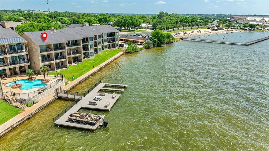 Experience the perfect blend of comfort, convenience, and scenic beauty in this fully furnished, recently remodeled 1-bedroom, 1-bath condo overlooking the main body of Lake Granbury. Whether you're looking for a peaceful retreat or a vibrant lifestyle in the heart of town, this lakefront gem checks every box.

Inside, you'll find tasteful updates throughout, including modern finishes, updated flooring, and a bright, open-concept layout. The spacious living area opens to a covered balcony with sweeping lake views—perfect for sipping morning coffee, enjoying a sunset, or simply soaking in the tranquil waterfront atmosphere.

This turnkey unit includes all furnishings and most utilities—cable, internet, and water are all included in the rent. Electricity to be paid by tenant A reserved covered parking space adds even more convenience, protecting your vehicle year-round. Unit does not have laundry hook ups, but the condo has a laundry facility on site.

The fully stocked kitchen features modern appliances and a clean design, while the refreshed bathroom offers stylish functionality. This condo is move-in ready—just bring your suitcase and start enjoying lake life.

Community amenities are designed to enhance your everyday experience. Enjoy a lakefront pool, a community day dock for boating and water access, a fitness center, and an on-site laundry facility. Whether you’re staying active or simply relaxing by the water, you’ll have everything you need at your fingertips.

Located just steps from historic downtown Granbury, you’re within walking distance of boutique shopping, local restaurants, live entertainment, and popular year-round events. From wine walks to art festivals, everything that makes Granbury special is right outside your door.

Don’t miss your chance to live lakeside in style and comfort. This rare rental opportunity combines scenic views, modern amenities, and a prime location.