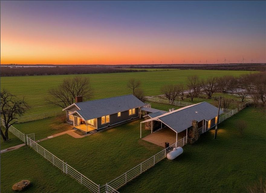 Just under 20 acres in Jack County, this versatile property offers the perfect blend of updated country living and recreational land. The three-bedroom, one-bath home has been thoughtfully remodeled, while preserving the original hardwood floors, adding warmth and character you don’t find in newer construction.
The property features a two-car garage or carport, along with an outdoor fireplace that doubles as a barbecue pit, ideal for entertaining family and friends. A barn with stables is already in place while it does need some TLC, its ready for your vision.  There is a large concrete pad already poured, making it an excellent opportunity to build out a custom barn or horse setup.
Multiple stock tanks are located on the property, and the land provides excellent hunting opportunities for whitetail deer and hogs. Whether you’re looking for a full-time residence, weekend getaway, hunting property, or recreational retreat, this tract offers endless possibilities.
The property is currently ag-exempt, keeping property taxes low, and is ideal for those seeking privacy, space, and flexibility in North Texas. Bring your vision, bring your buddies, and come enjoy everything this Jack County property has to offer.