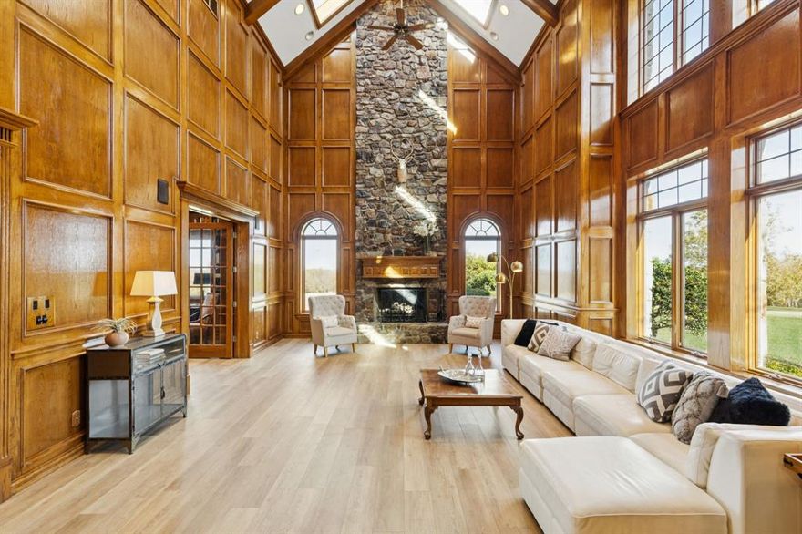 *NEW PRICE* $120K+ in updates, 2025. Luxury estate living and thoughtful craftsmanship come together at 362 Woodland Hills, a private cul-de-sac retreat set on 5+ acres inside the exclusive gated Woodland Hills community, offering an extraordinary blend of scale, privacy, and refined updates. The home welcomes you with a dramatic great room featuring a two story stone fireplace, skylights, custom solid oak, a spiral staircase, Pella casement windows, and a full bar. Additional main level living includes a well appointed family room featuring herringbone stone floors and custom cabinetry, library with a rolling ladder, exercise room, formal dining, and chef’s kitchen equipped with an island, double sinks, butler's and walk in pantry, premium appliances includes a SubZero fridge, and under cabinet lights. Extensive 2025 updates include new wide plank flooring, new iron front doors, fully remodeled primary and guest ensuites, and fresh interior paint that brightens and modernizes living spaces. The primary retreat is flooded with light, patio access, large walk in closet, and a beautifully renovated ensuite. Upstairs offers an expansive game room with a mezzanine overlook, custom built ins, and three additional bedrooms with generous closets and ensuite baths. Outdoors, the property delivers a true resort experience with a 24x40 pool, 10x10 spa, outdoor kitchen with grill, granite, fridge, and sink, covered deck with fans, and surround sound equipped entertaining. Additional amenities include a fully lit tennis court, basketball goal, and convertible volleyball setup, a stocked lake for fishing, 36x24 metal barn with overhead doors, a private well, whole home water softener and filter, and a 100 tree orchard producing nuts and fruits. With endless sunsets, generous storage, updated mechanicals, newer roof, and a peaceful country setting close to everything, this estate offers rare space, character, and comfort in Sherman's top community.