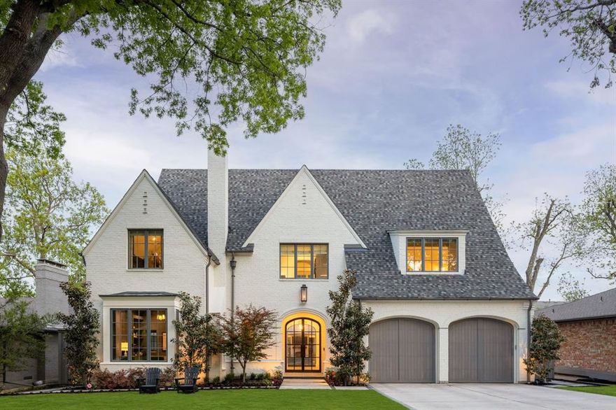 Custom built by Michael S Wilson on a quiet, picturesque block in the heart of Lakewood, this architecturally striking residence reflects an elevated standard of design, craftsmanship, & execution.Antiqued painted brick with artisan detailing & dramatic Lincoln Windows establish a timeless presence, while an arched steel front door—paired with a matching arched steel window overlooking the pool—creates a memorable sense of arrival.A grand floating staircase anchors the entry with immediate visual impact. Interiors are defined by 5” rift & quartered white oak floors, intricate herringbone patterns, smooth-finish walls, & thoughtfully curated architectural detailing throughout.The study-lounge is richly appointed with tailored millwork, a coffered ceiling, & an Isokern fireplace, with a secondary working study discreetly tucked behind—designed to conceal function without compromise. Custom white oak arched doors & extensive millwork carry seamlessly from space to space.The kitchen serves as both centerpiece & workspace, featuring quartzite surfaces, a premium Wolf & Sub-Zero appliance package, & a fully outfitted working pantry. Expansive sliding doors open to a private outdoor setting, creating effortless indoor-outdoor flow.A centrally positioned, fully equipped bar enhances entertaining, connecting to the covered loggia with fireplace & in-ceiling heaters.The primary suite offers a true retreat, highlighted by architectural ceiling lines, refined wall detailing, & a spa-inspired bath with floating tub, steam shower, dual vanities, & a custom closet with makeup vanity.Upstairs,a spacious game room is complemented by en-suite secondary bedrooms with WICs & elevated design continuity.Additional highlights include a secondary staircase, pool bath access, outdoor kitchen, resort-style pool & spa + great grass yard, Control4 automation,& curated landscaping.Ideally located just moments from Lakewood Park & White Rock Lake.Homes of this caliber by MSW are rarely available
