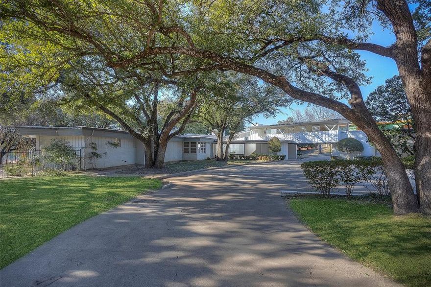 Gorgeous 1.6 acre golf course property on the 11th hole of Ridglea Country Club's north course. Single story mid-century modern home with stunning views, old-growth oak trees, large rooms and an open floor plan evoking the best of the glamorous 1950's. Fabulous and fun opportunity to remodel an authentic mid-century home, or to build your dream house on one of the prettiest, big, golf-course lots in Fort Worth. Either way, you will have something really special! The sunsets are magnificent, and the serene setting is extraordinary. 
Square Footage does not include the second story game room.