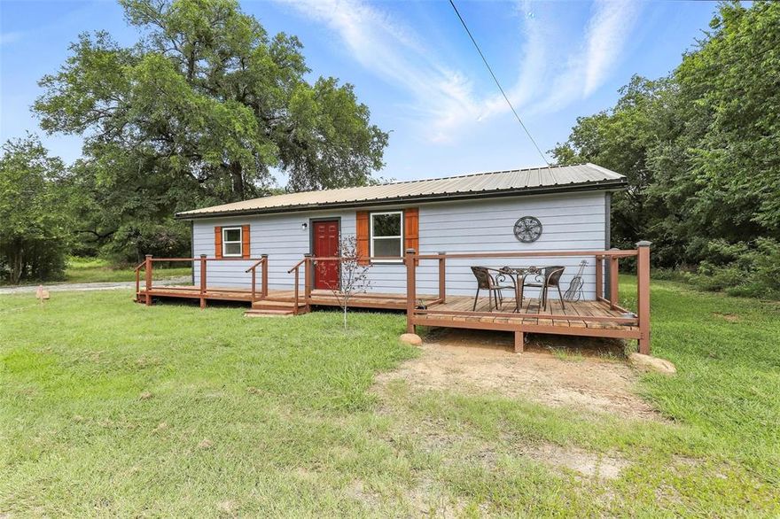 Receive a $1,000 credit toward closing costs when using our preferred lender. 

Southern Charmer – Fully Remodeled & Full of Heart!
Y’all, this one’s a true gem! Tucked away just minutes from the lake, this fully renovated 3-bedroom, 1.5-bath beauty is sitting pretty - offering room to stretch out, plant roots, or build something special. 

From the moment you pull up, you’ll feel the peaceful charm. A cozy front porch invites slow sips of sweet tea while you take in the open view and quiet surroundings - no direct neighbors across the street, just wide skies and calm vibes.

Step inside to a bright, cheerful living space with all the modern touches and none of the work left to do - everything’s been updated from top to bottom! The layout is open and airy, perfect for everyday livin’ or hosting your favorite folks. Out back, a greenhouse awaits your garden dreams or year-round green thumbs.

The nice sized yard will give you all kinds of possibilities - chicken coop, fire pit, or just enjoy the elbow room. Just minutes from the boat ramp and pool and the heart of historic Granbury Square, this home is all about easy living, outdoor fun, and small-town charm. This property would be just perfect for a vacation rental with loads of parking for your boat and guest vehicles.

If you’re looking for an adorable home with Southern flair - this one’s got the goods. Come see for yourself before it’s gone!