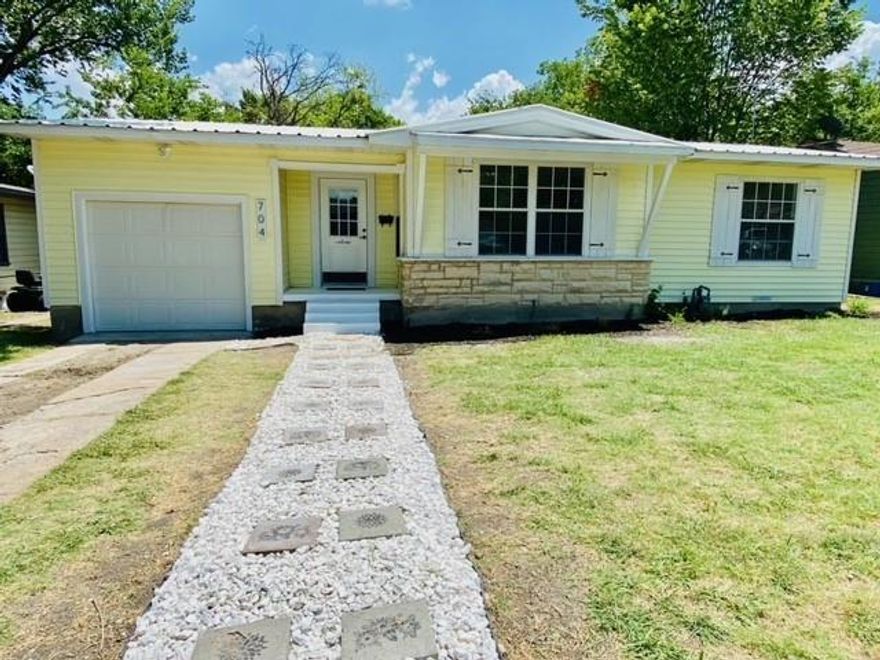 Adorable remodeled home in the highly sought after downtown Rockwall historic district. You walk into an open living room with the kitchen and garage to the left. The two bedrooms and bathroom are to the right as you walk through the living area. Kitchen features butcher block counters, bathroom is newly remodeled and there is new carpet and flooring throughout. Spacious 1 car garage and drive way for more parking. The fenced in backyard is very large with beautiful mature trees. You don't want to miss this! Perfect home for renters who want to be in an awesome location!