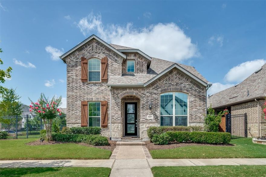 This stunning Northeast-facing home is perfectly located on an oversized corner lot in the prestigious Viridian community. With a striking brick & stone exterior, it’s framed by wrought iron & wood fencing that adds classic character & appeal. Inside, rich engineered wood flooring flows through the main living areas, setting the stage for modern elegance. The home’s integrated smart features offer effortless convenience & peace of mind. The gourmet kitchen is a true centerpiece with a large white quartz island, stainless built-in appliances, gas cooking, & 42-inch custom cabinetry—ideal for the home chef & entertainer alike. A vaulted ceiling in the formal dining room adds architectural flair, while 18-foot ceilings in the breakfast area & family room create an airy sense of openness. Expansive 15-foot windows bathe the home in natural light, & a stone-surround fireplace with timber mantle anchors the family room. The dedicated office offers an inspiring workspace, while the downstairs primary suite provides a serene retreat with a spa-inspired bath, oversized shower, & generous custom closet. Upstairs, a loft-style game room overlooks both the family room & dining area, with two bedrooms & a full bath completing the level. Step out to your covered patio, shielded from the evening sun & equipped with a gas stub for grilling. The rear-entry garage via alley access enhances curb appeal & convenience. Existing smart fridge, washer & dryery remain! Viridian residents enjoy resort-style pools, a private beach, sailing center, lakes, tennis & pickleball courts, trails, & an on-site elementary. Ideally located near major thoroughfares, this home offers effortless access to world-class shopping, dining, & entertainment. Experience the perfect blend of luxury, lifestyle, & location. Welcome home to Viridian!