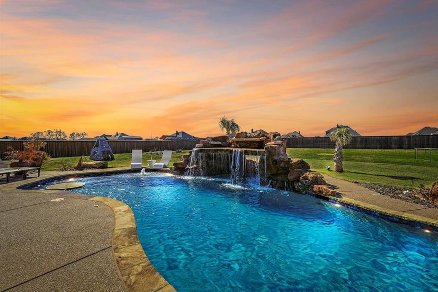 MULTIPLE OFFERS RECEIVED!!!! Beautiful 4 bed+2.5 bath+media room located in Midlothian ISD with NO HOA or city taxes! Over 1.1 acres fully fenced backyard oasis that includes a heated pool with waterfall feature, grotto, in-pool lounge chairs and beverage table. Pool bathroom located with outside access for all your guest’s needs without bringing the water inside. RV and toys welcome, this home has a three-car garage and plenty of secure parking behind the fence. The interior features a generously appointed kitchen with gas cooktop and SS appliances, an open floor plan, media room with mini bar, and separate flex room (can be used as extra bedroom, office, workout or craft room) to accommodate the whole family and their hobbies. After all the swimming and hobbies, you can also enjoy the walk-through shower in the primary suite or a night by the fire in the living room, or on the back porch. Don’t miss this home built for entertaining and comfort!